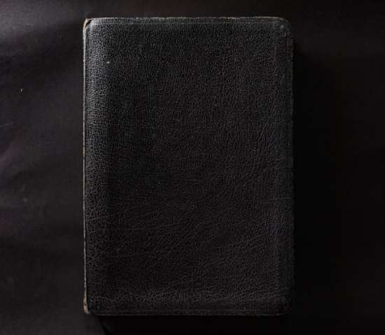 A black leather Bible, one of its purposes being a historical record