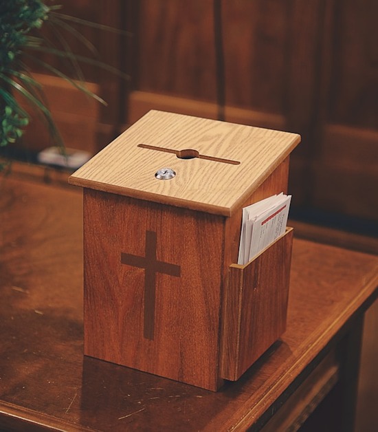  Sometimes there are little boxes for offerings to go into. These may have envelopes on the side and a small opening on top.