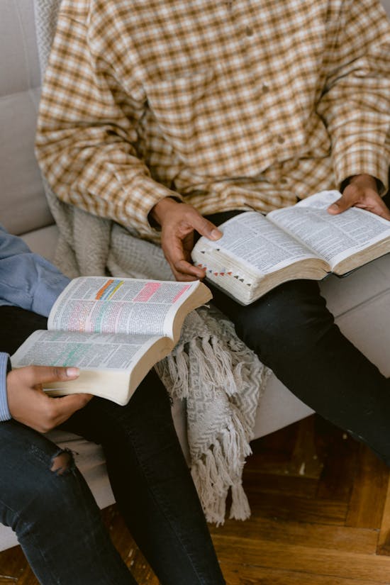 Two people have a Bible study. It's common to study the Bible with someone when joining the church.