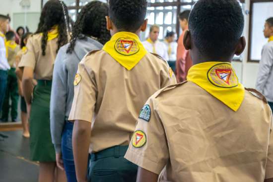 Pathfinders in their uniforms lined up during marching practice